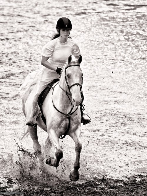 A horse and rider gallop through a lake. Olympus OM-D EM-1 Test Shot with the Olympus 300mm f2.8 Four Thirds lens (effectively a 600mm f2.8).  Castle Leslie, Glaslough, Ireland. September 10, 2013. Photo: ©Edmond Terakopian    *jpeg image processed in Aperture and Silver Efex Pro 2*
