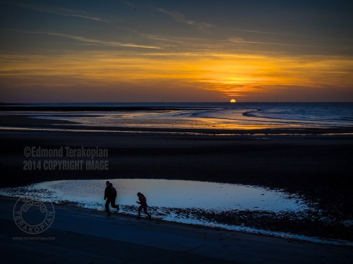 Sunset run,  This image was shot on an Olympus OM-D E-M1 camera and Olympus M.Zuiko 25mm f1.8 lens. Margate Sands, Kent. April 15, 2014. Photo: ©Edmond Terakopian