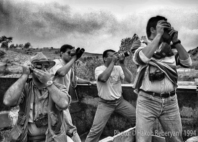 Edmond Terakopian (far left) in the back of a lorry delivering supplies to the front line in Martakert, Karabakh. August 1994. Photo: Hakob Berberyan