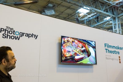 "Essentials In Documentary Film Making" talk by Edmond Terakopian at the Filmmaker Theatre on behalf of Snapper Stuff. Showing "1 Sixpence 1 Play", shot on the Olympus OM-D E-M1. The Photography Show, NEC, Birmingham. March 23, 2015. Photo: Freia Turland