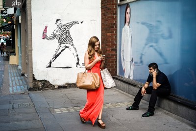 Banksy style graffiti (not an original Banksy) in Broadwick Street, Soho, London. July 22, 2014. Photo: Edmond Terakopian